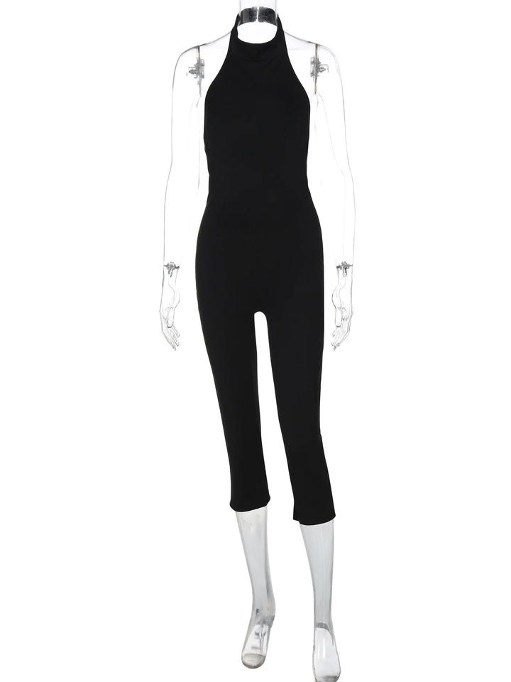 Hugcitar Ribbed Halter Backless Solid Button Sexy Bodycon Skinny Jumpsuit Summer Women Fashion Vacation Romper Streetwear Club